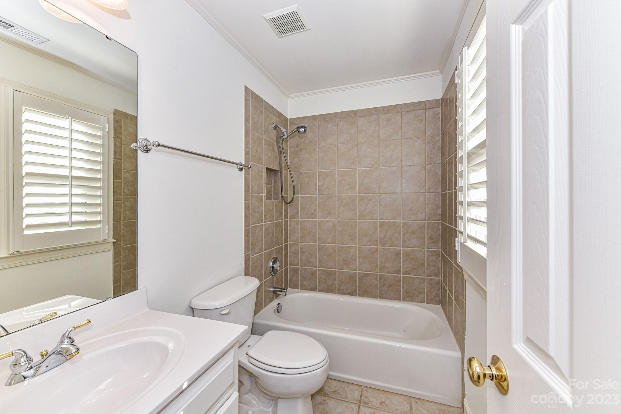 4030 Fawn Hill Road Matthews, NC 28105 - Photo 27 of 48 a bathroom with a sink toilet and shower