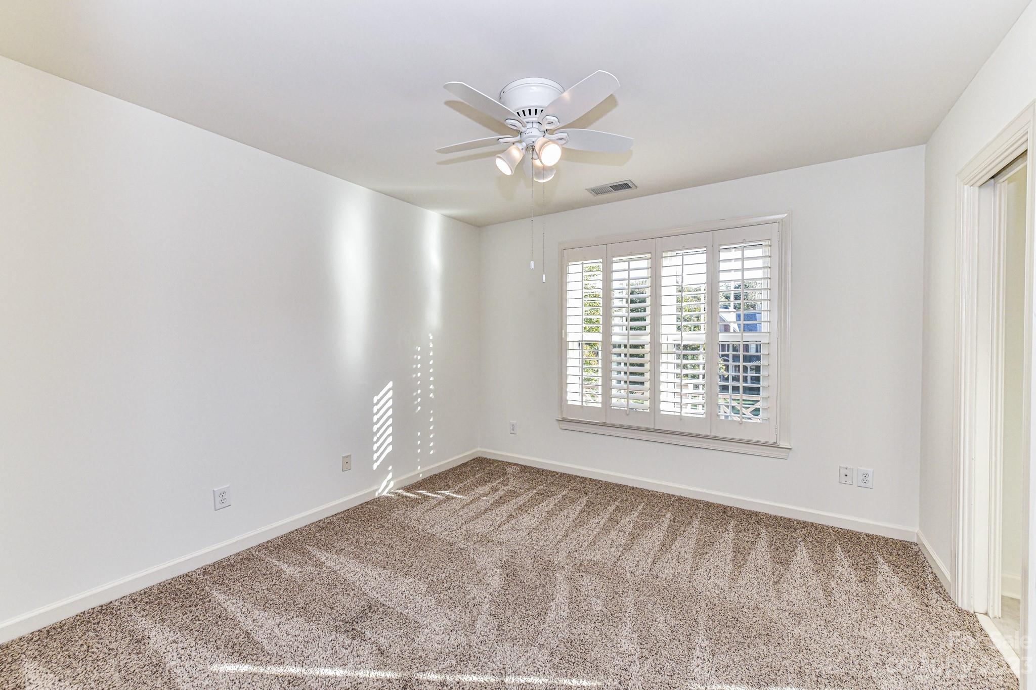 4030 Fawn Hill Road Matthews, NC 28105 - Photo 30 of 48 a view of an empty room with a window