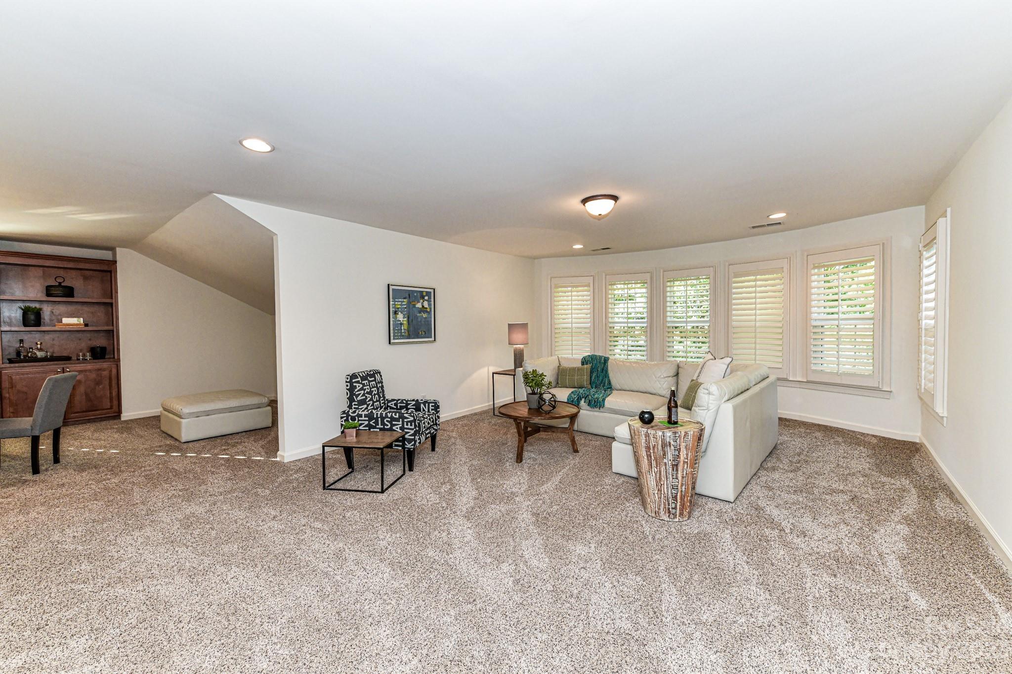 4030 Fawn Hill Road Matthews, NC 28105 - Photo 31 of 48 a living room with furniture and a large window