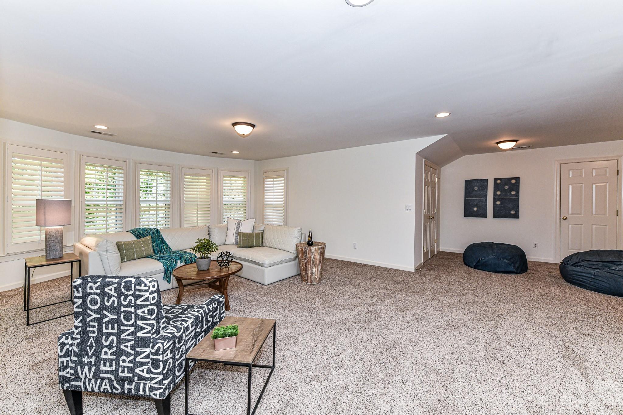 4030 Fawn Hill Road Matthews, NC 28105 - Photo 32 of 48 a living room with furniture and wooden floor