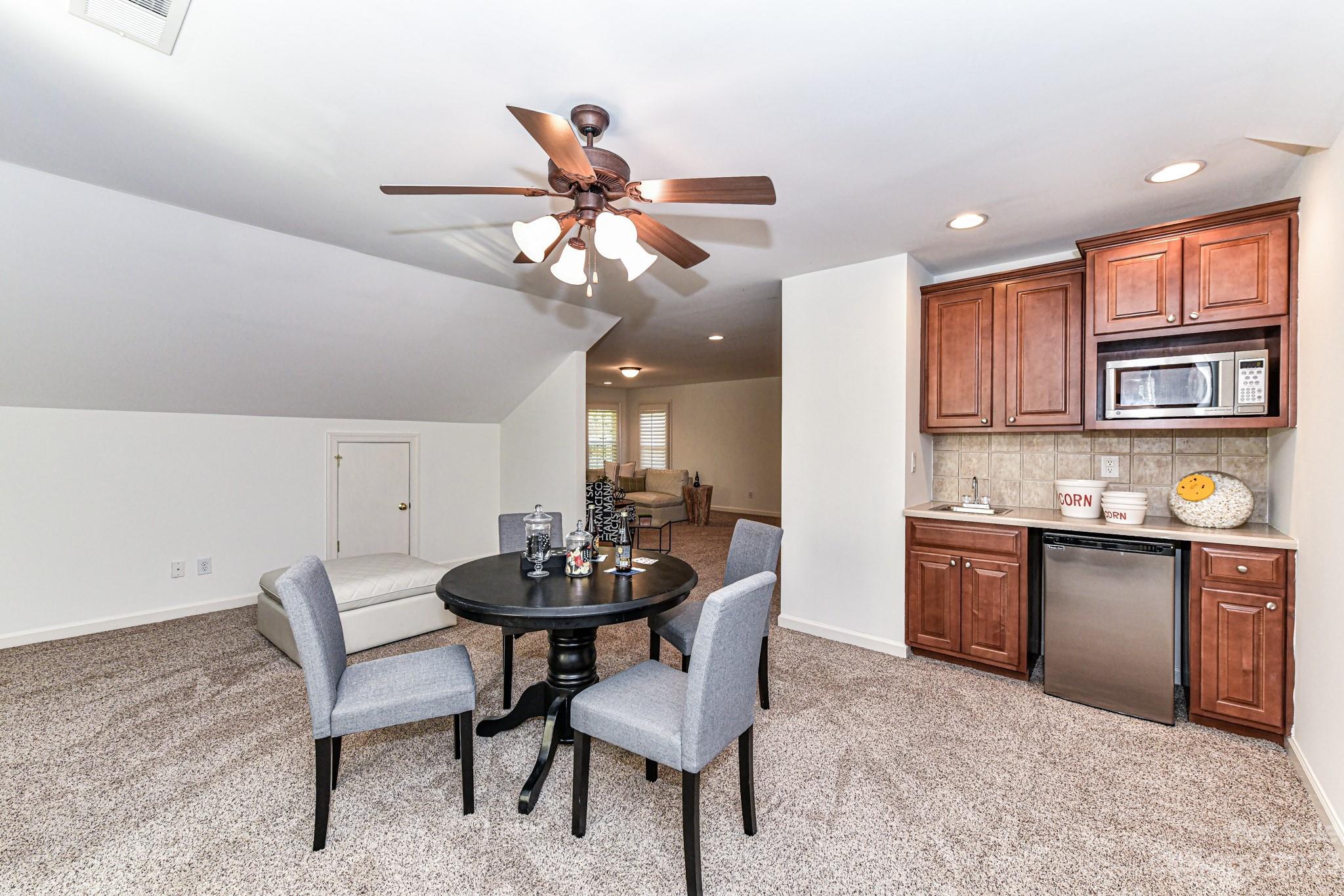 4030 Fawn Hill Road Matthews, NC 28105 - Photo 33 of 48 a view of a dining room with furniture and wooden floor
