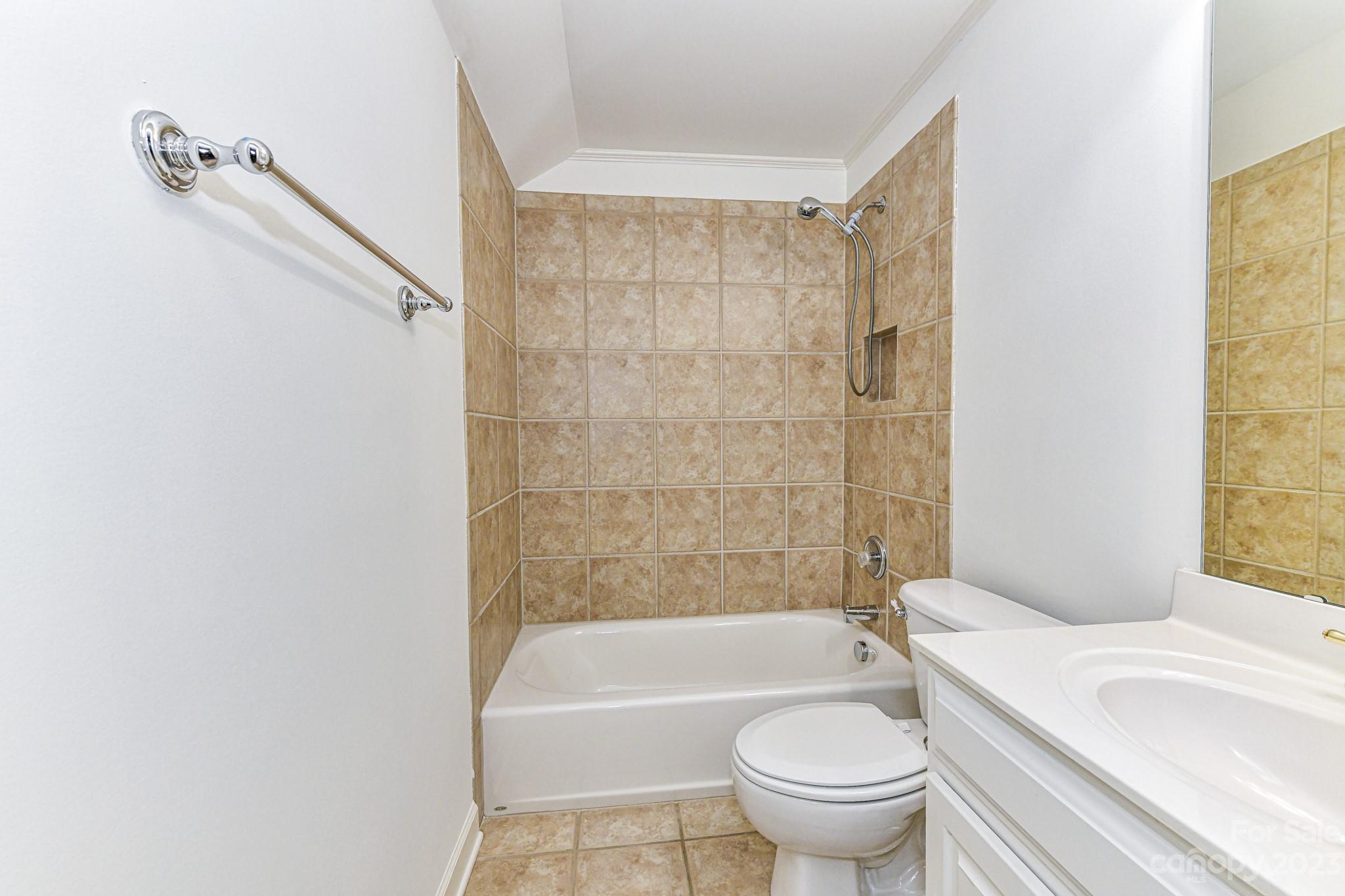 4030 Fawn Hill Road Matthews, NC 28105 - Photo 36 of 48 a bathroom with a toilet and a bathtub