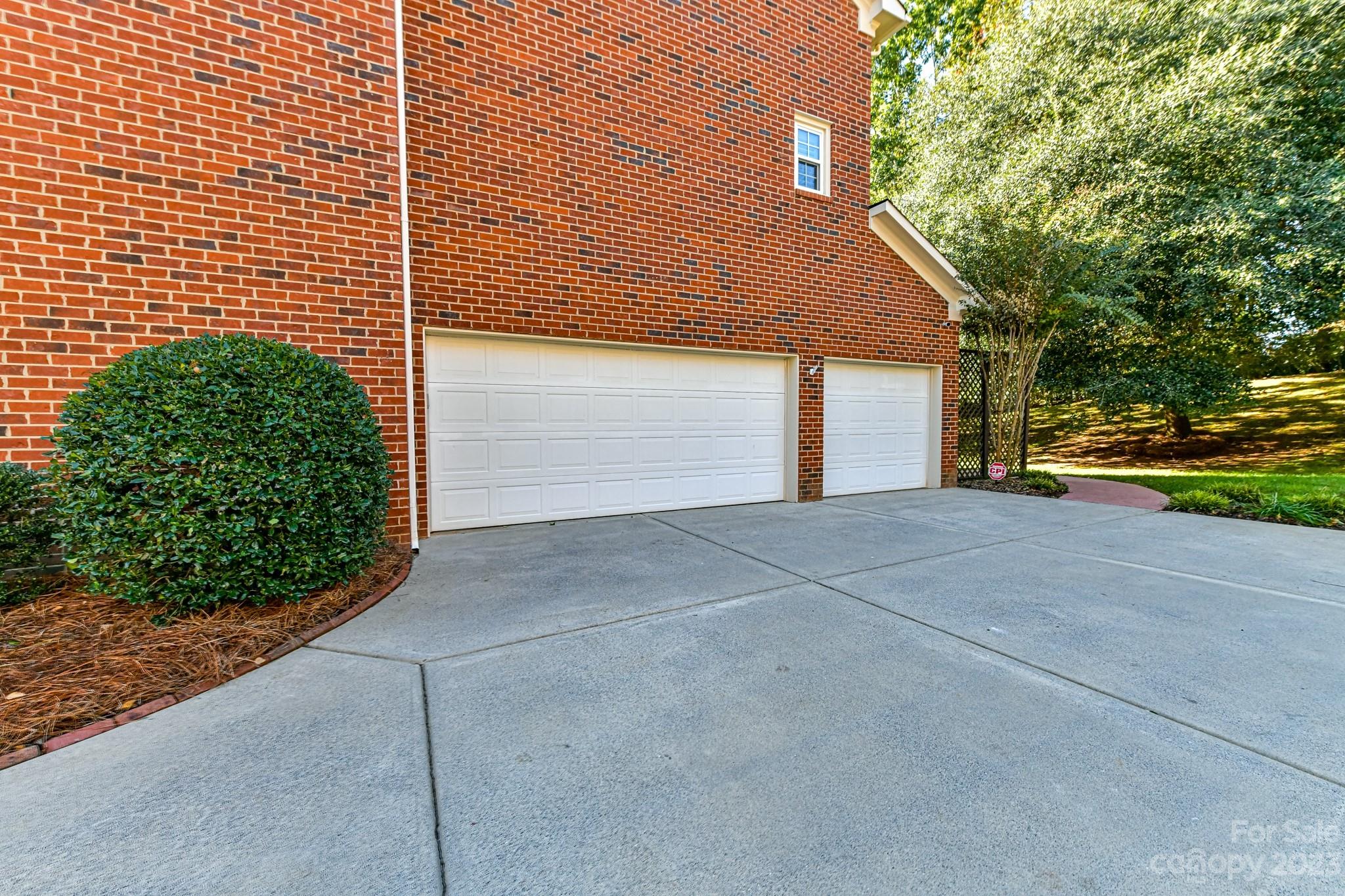 4030 Fawn Hill Road Matthews, NC 28105 - Photo 40 of 48 a view of backyard of house and tree