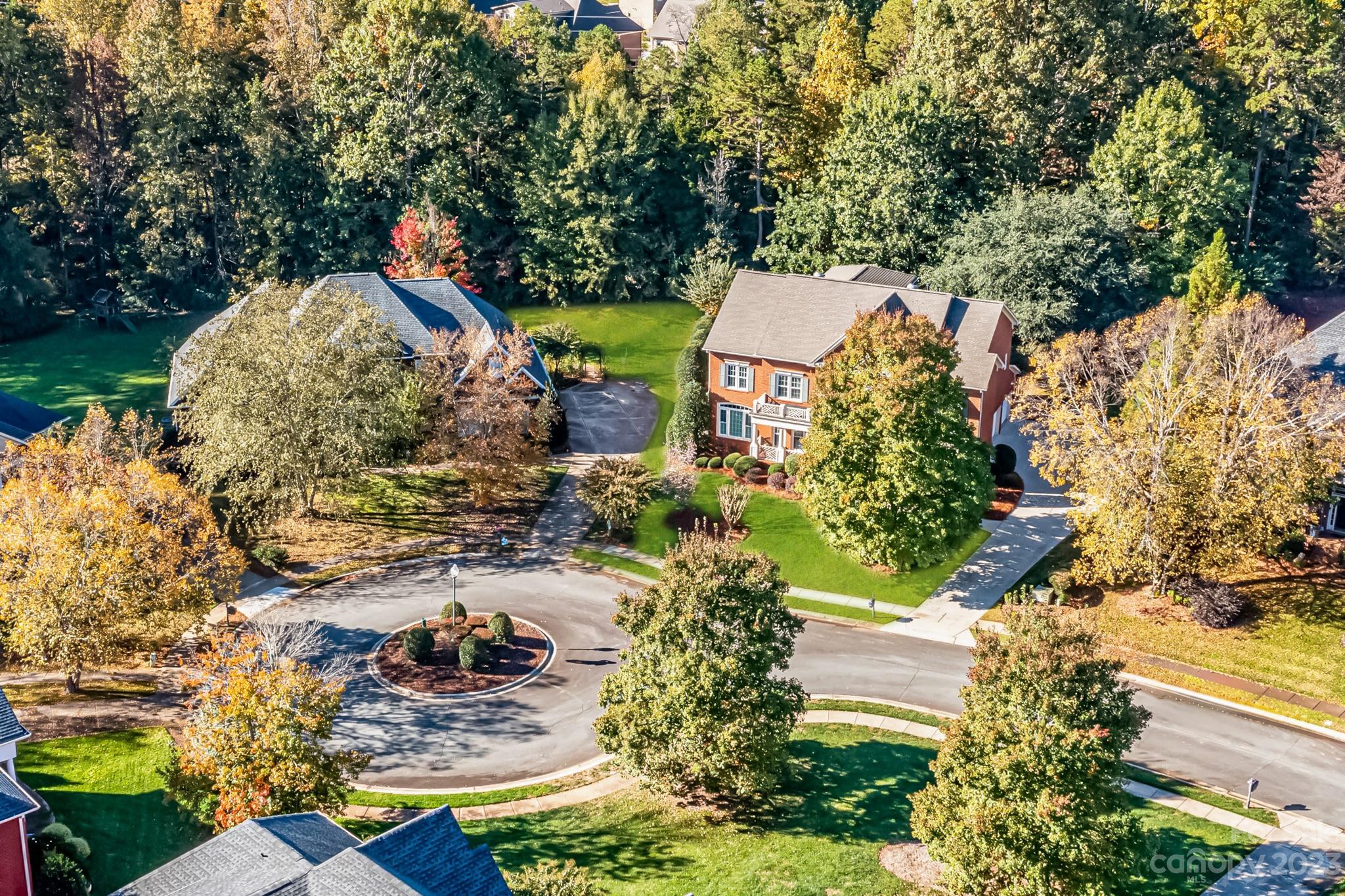 4030 Fawn Hill Road Matthews, NC 28105 - Photo 41 of 48 an aerial view of a house with a yard basket ball court and outdoor seating