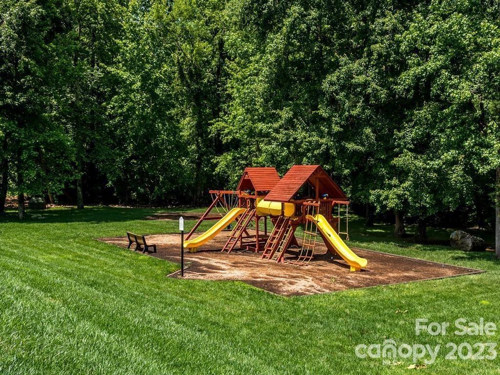 4030 Fawn Hill Road Matthews, NC 28105 - Photo 48 of 48 a view of a park with a slide