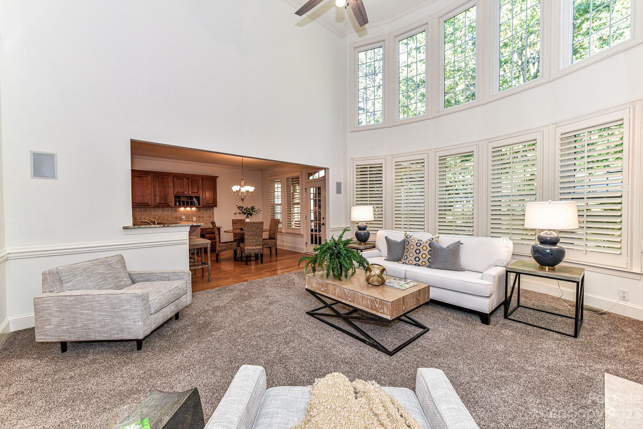 4030 Fawn Hill Road Matthews, NC 28105 - Photo 5 of 48 a living room with furniture and a large window