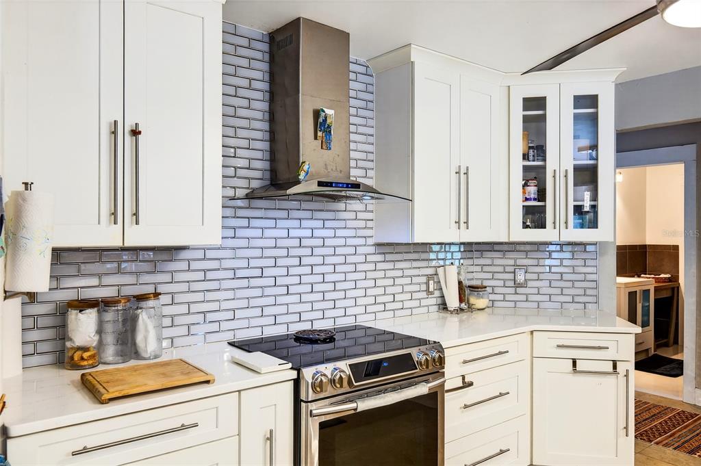 11795 Southwest Highway 484 Dunnellon, FL 34432 - Photo 13 of 51 a kitchen with cabinets and appliances