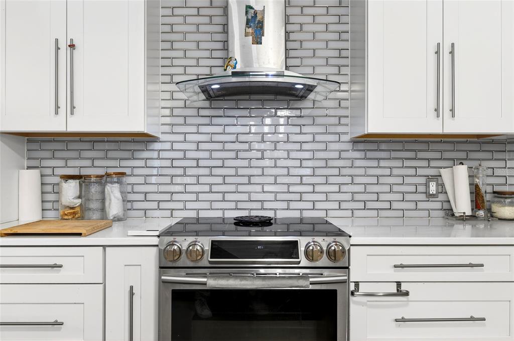 11795 Southwest Highway 484 Dunnellon, FL 34432 - Photo 14 of 51 a kitchen with a stove and a microwave