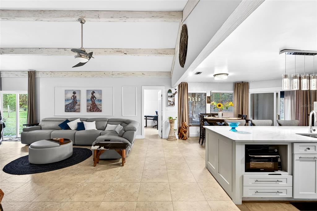 11795 Southwest Highway 484 Dunnellon, FL 34432 - Photo 26 of 51 a living room with furniture and a ceiling fan