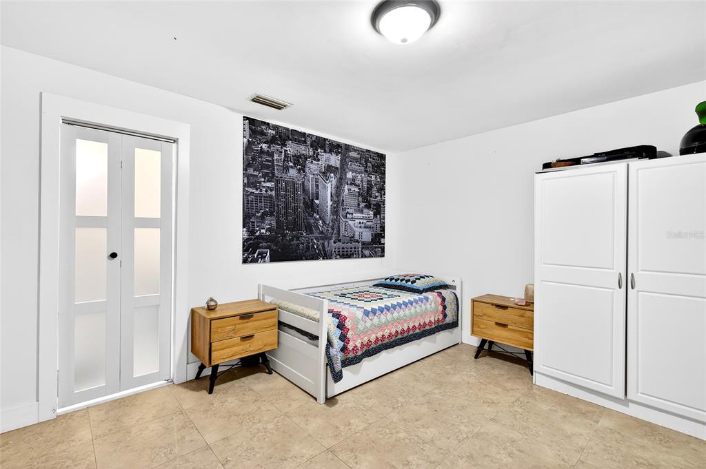 11795 Southwest Highway 484 Dunnellon, FL 34432 - Photo 28 of 51 a bedroom with a bed and a window