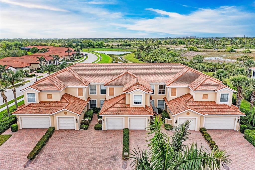 23261 Banbury Way, Unit 501 Venice, FL 34293 - Photo 75 of 75 an aerial view of a house