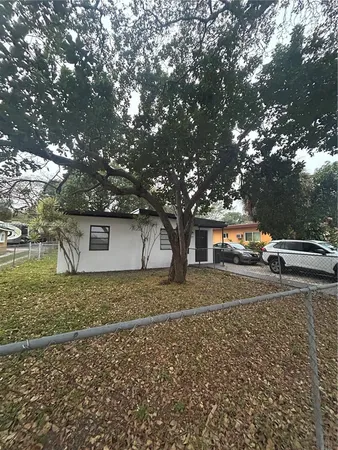 a house view with a outdoor space
