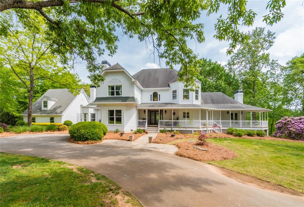 Picturesque estate home on 7.5 +/- private acres overlooks gorgeous rural view, board fenced pastures, pool and barn.  Located in heart of Milton...excellent location close to schools, shopping, easy proximity to downtown Alpharetta.