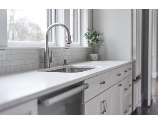 120 Galloupes Point Road Swampscott, MA 01907 - Photo 13 of 30 a kitchen with a sink and a window