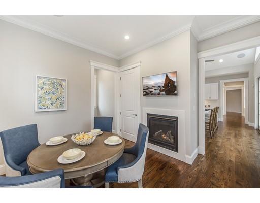 120 Galloupes Point Road Swampscott, MA 01907 - Photo 14 of 30 a living room with furniture and a fireplace