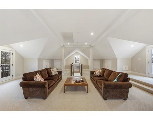 120 Galloupes Point Road Swampscott, MA 01907 - Photo 25 of 30 a living room with furniture and a couch
