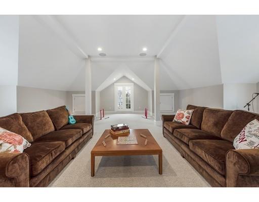 120 Galloupes Point Road Swampscott, MA 01907 - Photo 26 of 30 a living room with furniture and a couch