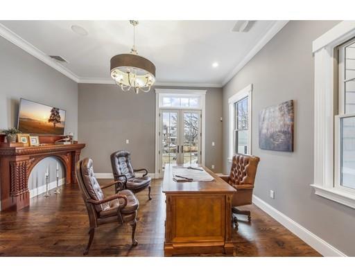 120 Galloupes Point Road Swampscott, MA 01907 - Photo 5 of 30 a view of a dining room with furniture and wooden floor