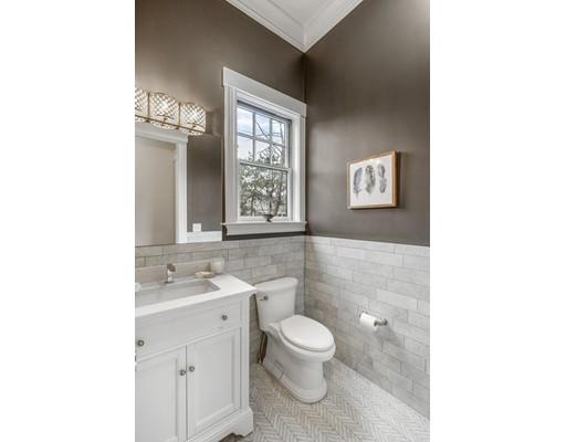 120 Galloupes Point Road Swampscott, MA 01907 - Photo 6 of 30 a bathroom with a toilet sink and mirror