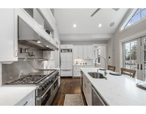 120 Galloupes Point Road Swampscott, MA 01907 - Photo 10 of 30 a kitchen that has a sink and a stove