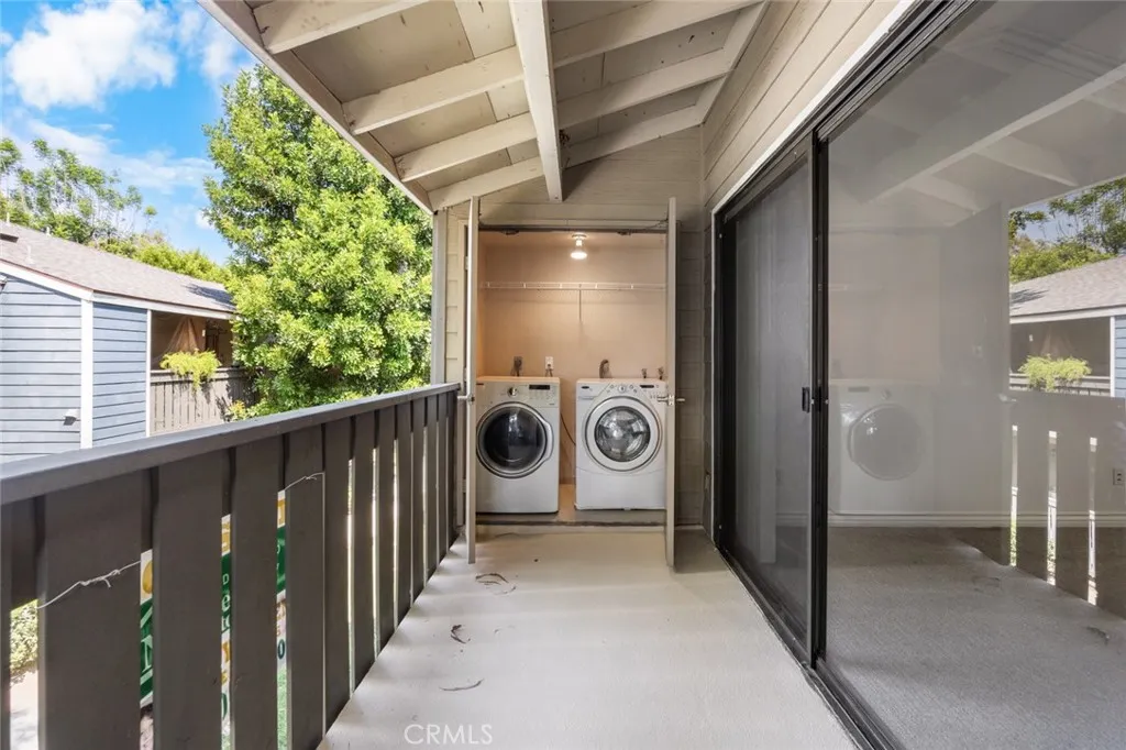 3535 Banbury Drive, Unit 158 Riverside, CA 92501 - Photo 11 of 15 a view of a hallway with wooden walls and stairs