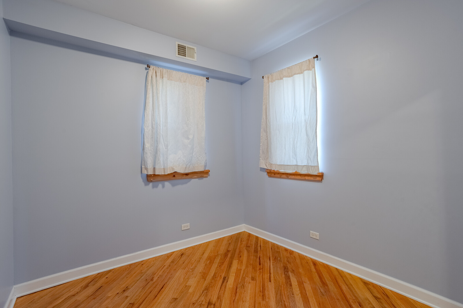 3100 West Addison Street, Unit 1A Chicago, IL 60618 - Photo 19 of 29 a view of an empty room and window