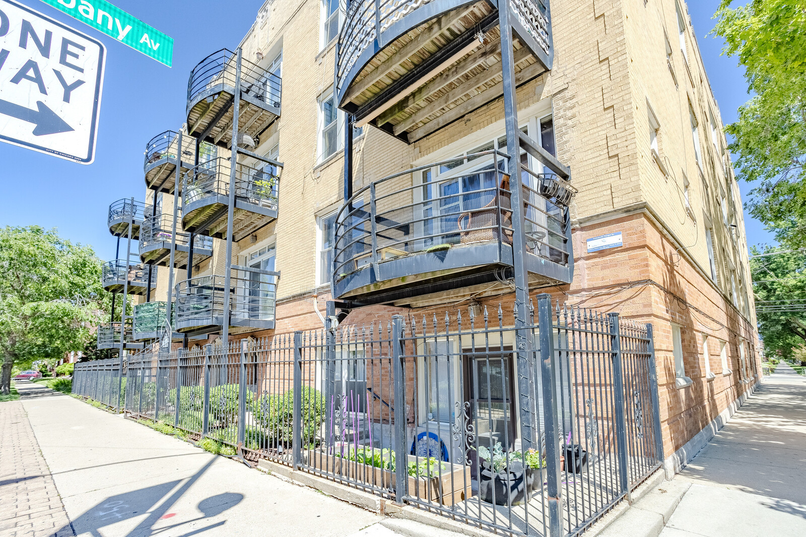 3100 West Addison Street, Unit 1A Chicago, IL 60618 - Photo 2 of 29 a view of a building with a street