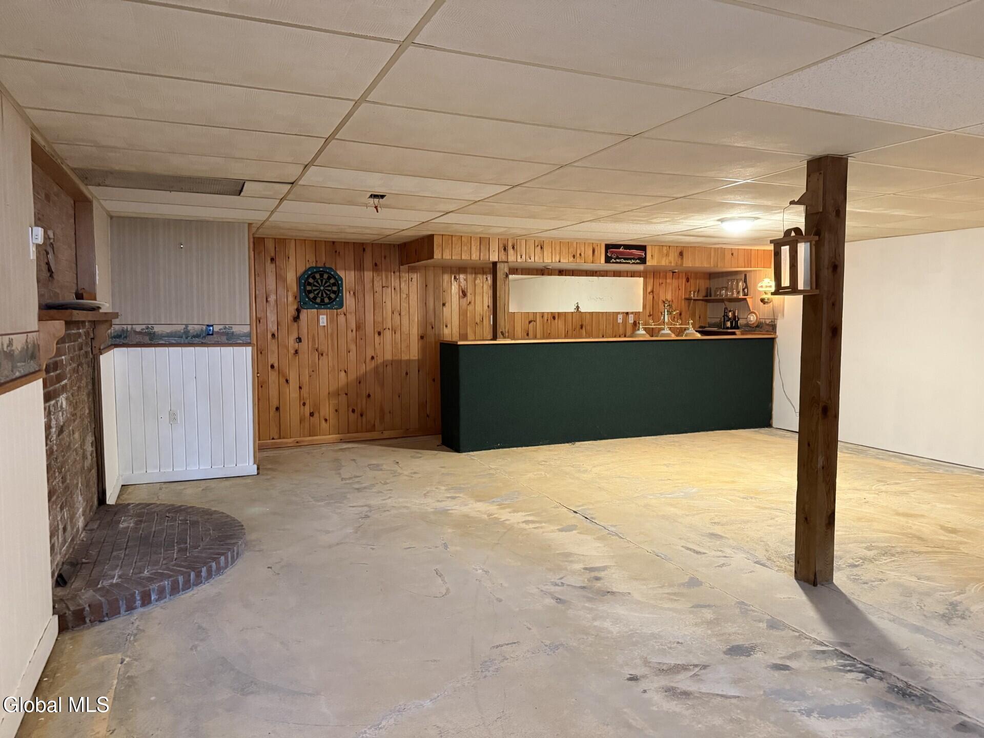 695 Dean Road Hudson Falls, NY 12839 - Photo 35 of 35 base with bar and wood stove heart