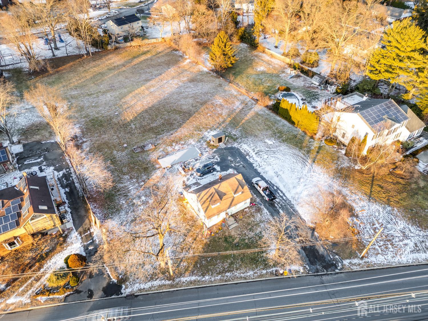 430 Ridge Road Dayton, NJ 08810 - Photo 3 of 4 a view of swimming pool from a window