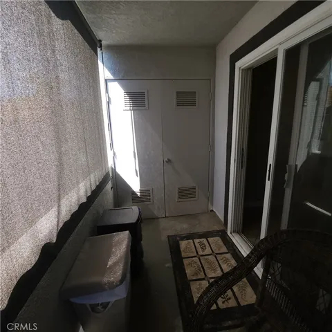 a view of an entryway with sitting area