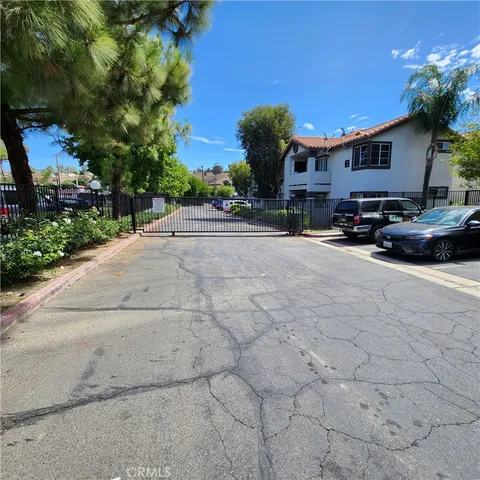 a view of a car parked in front of a house