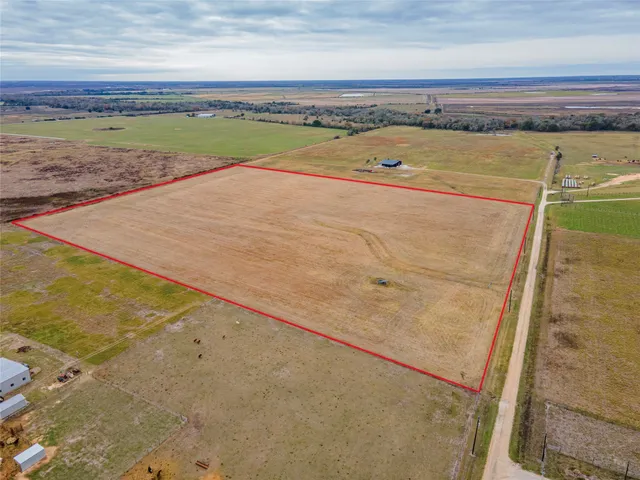 a view of a swimming pool and an outdoor space