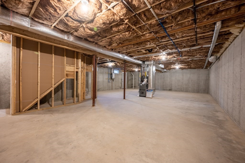 5 Turtle Lane, Unit 5 Sterling, MA 01564 - Photo 25 of 30 a view of empty room with wooden floor
