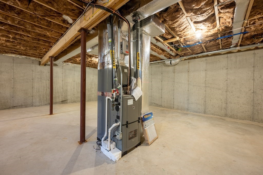 5 Turtle Lane, Unit 5 Sterling, MA 01564 - Photo 26 of 30 a view of a room with gym equipment