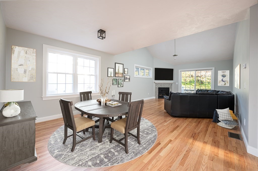 5 Turtle Lane, Unit 5 Sterling, MA 01564 - Photo 9 of 30 a living room with furniture a flat screen tv a rug and a window