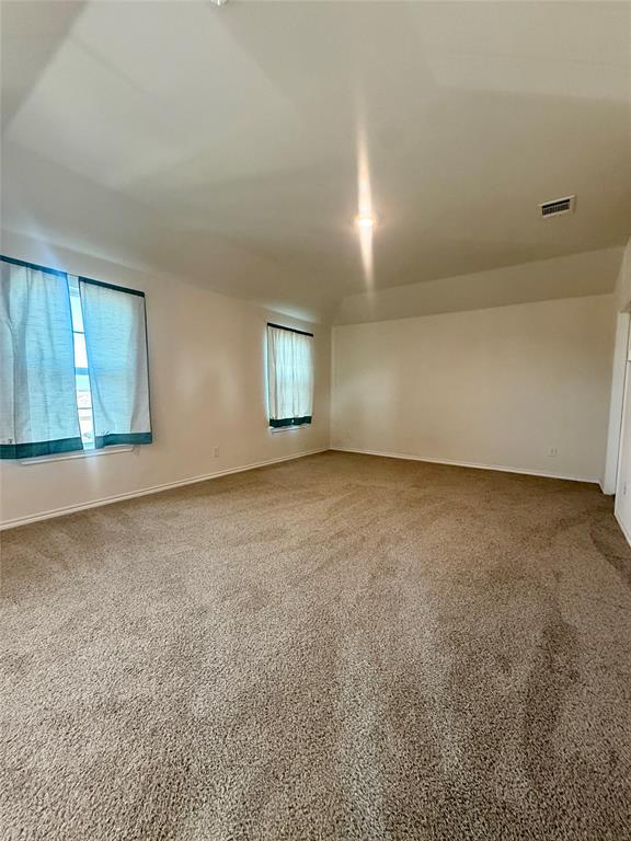 916 Country Road Royse City, TX 75189 - Photo 18 of 24 an empty room with a empty space and windows