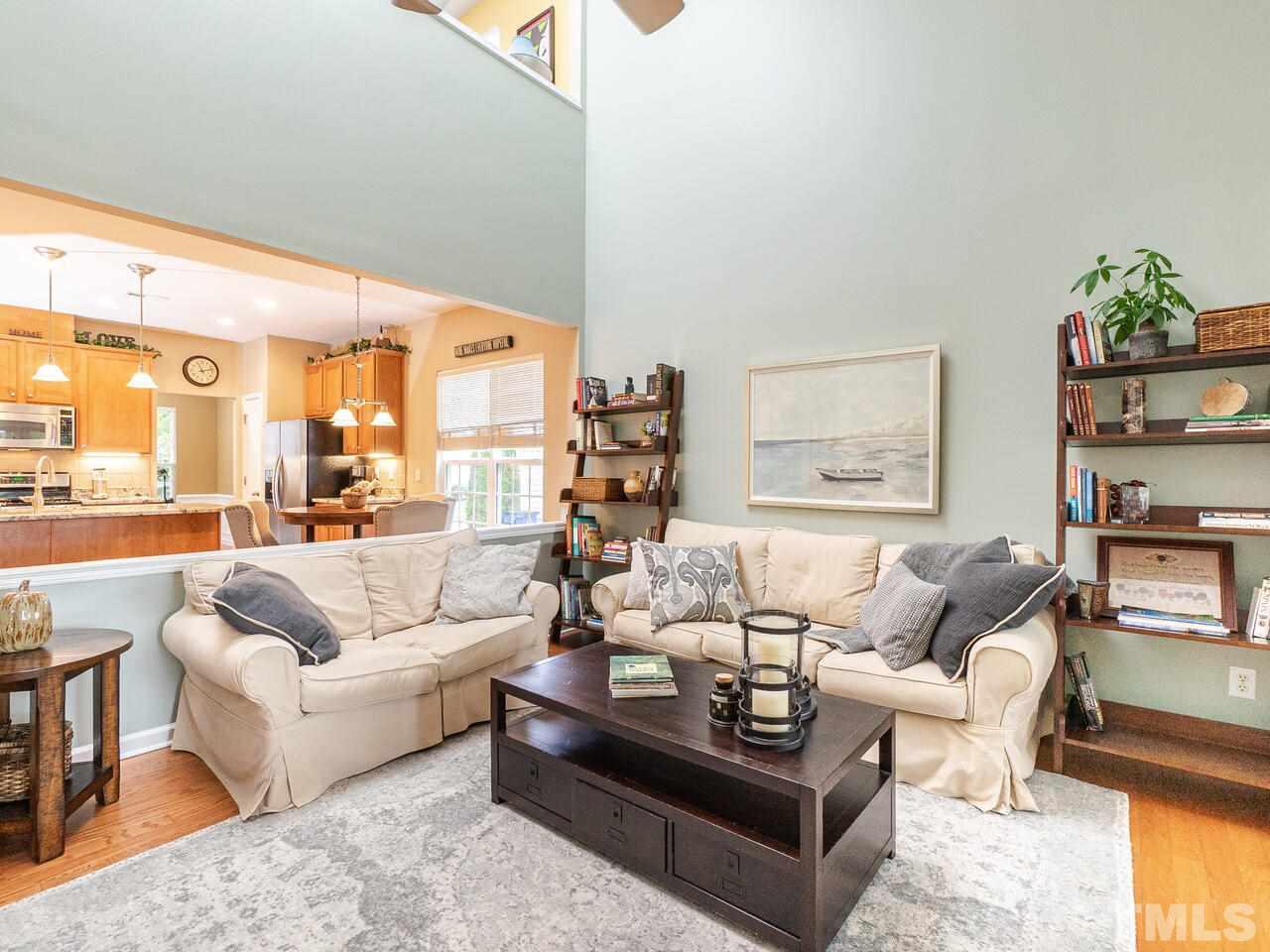 3901 Cathedral Bell Road Raleigh, NC 27614 - Photo 12 of 30 a living room with furniture dining area and a large window