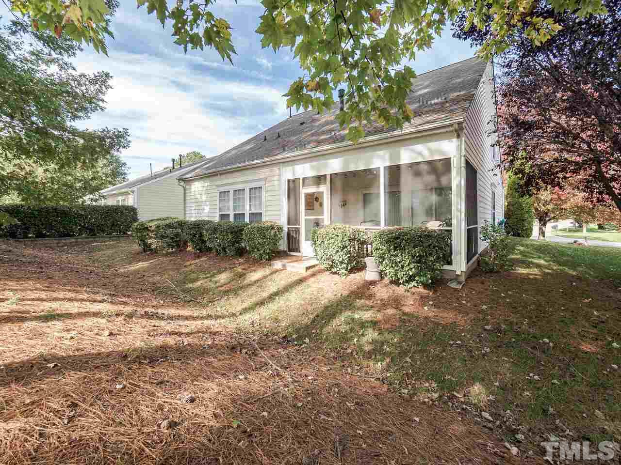 3901 Cathedral Bell Road Raleigh, NC 27614 - Photo 25 of 30 a view of a house with a yard