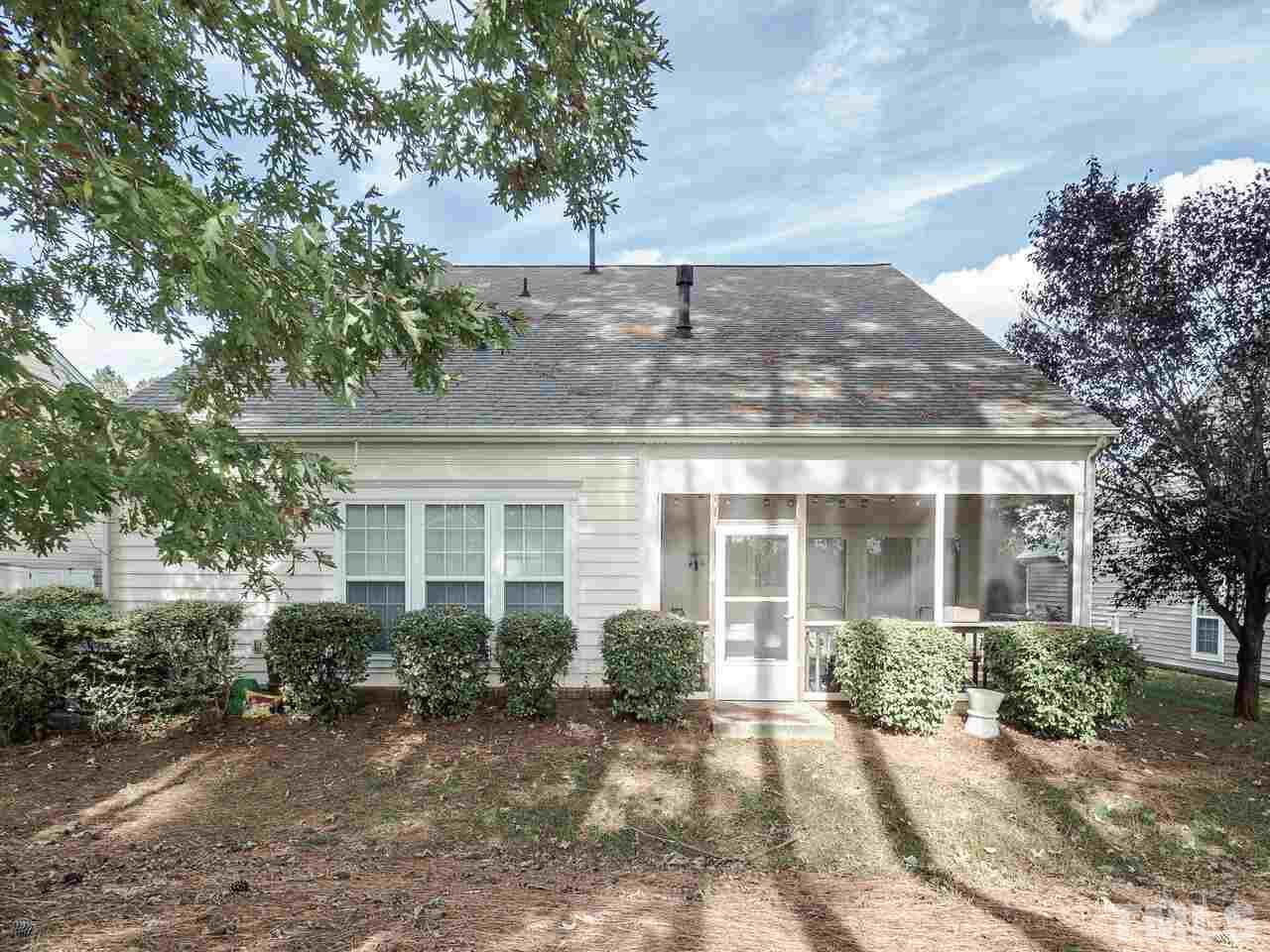 3901 Cathedral Bell Road Raleigh, NC 27614 - Photo 26 of 30 a view of a house with a yard and potted plants