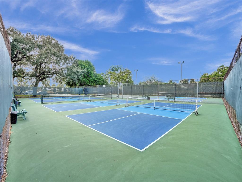 9235 Lagoon Place, Unit 207 Davie, FL 33324 - Photo 50 of 59 a view of a tennis court