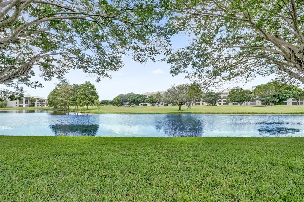 9235 Lagoon Place, Unit 207 Davie, FL 33324 - Photo 56 of 59 a view of a lake