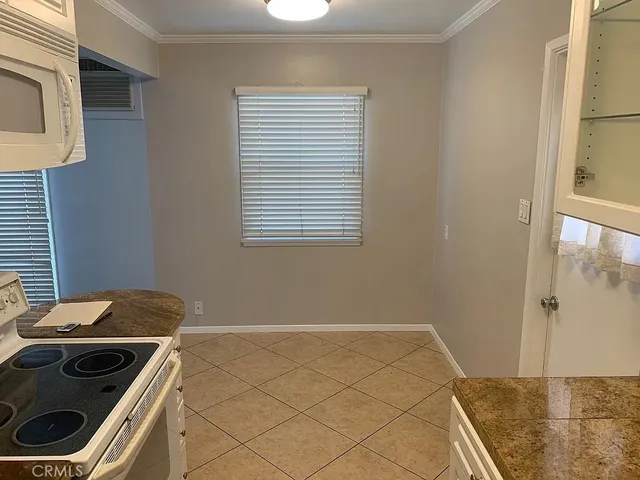 a view of a room with rack on the wall