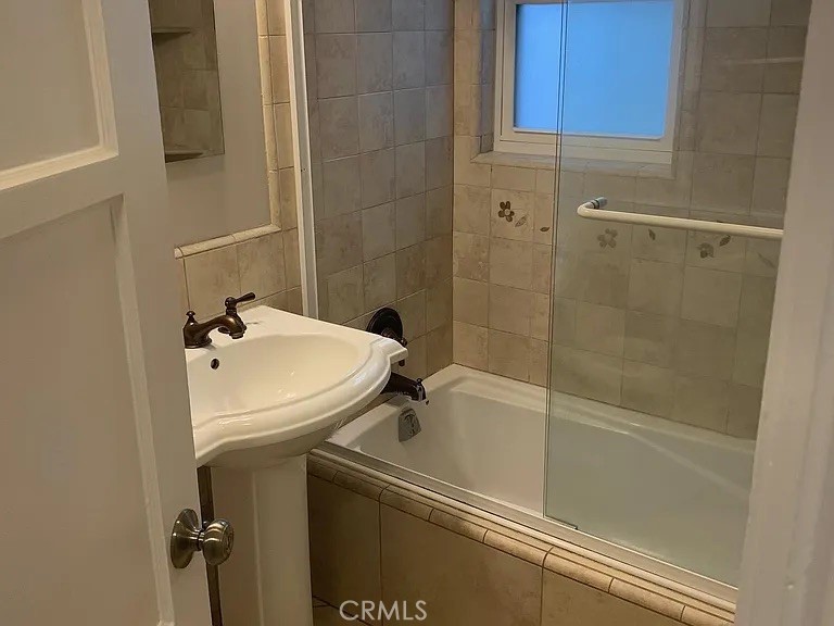 4401 Division Long Beach, CA 90803 - Photo 29 of 50 a bathroom with a sink and mirror