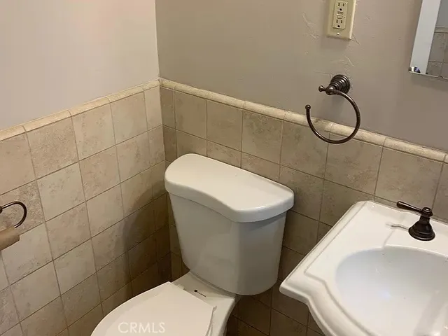 an aerial view of a house with an outdoor space