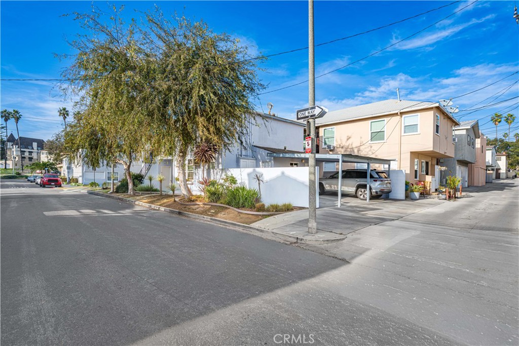 4401 Division Long Beach, CA 90803 - Photo 8 of 50 a city street lined with tall buildings
