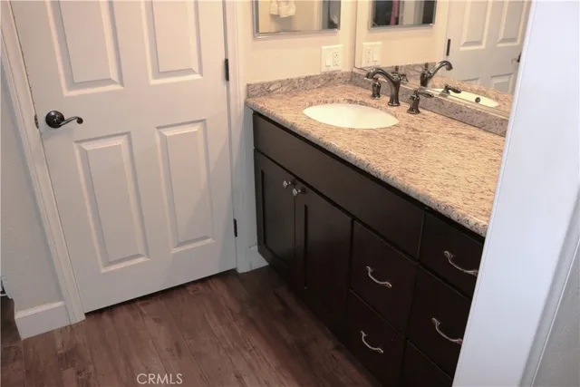 a white toilet sitting next to a shower curtain