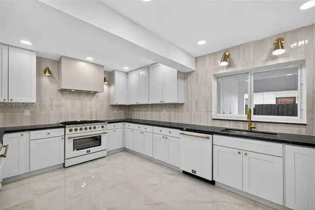 a view of kitchen with cabinets and wooden floor
