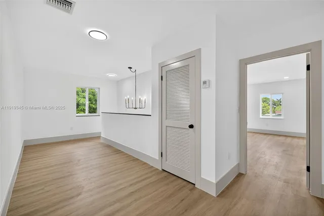 a spacious bathroom with a double vanity sink mirror and