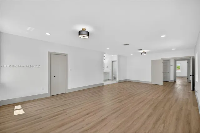 an empty room with windows