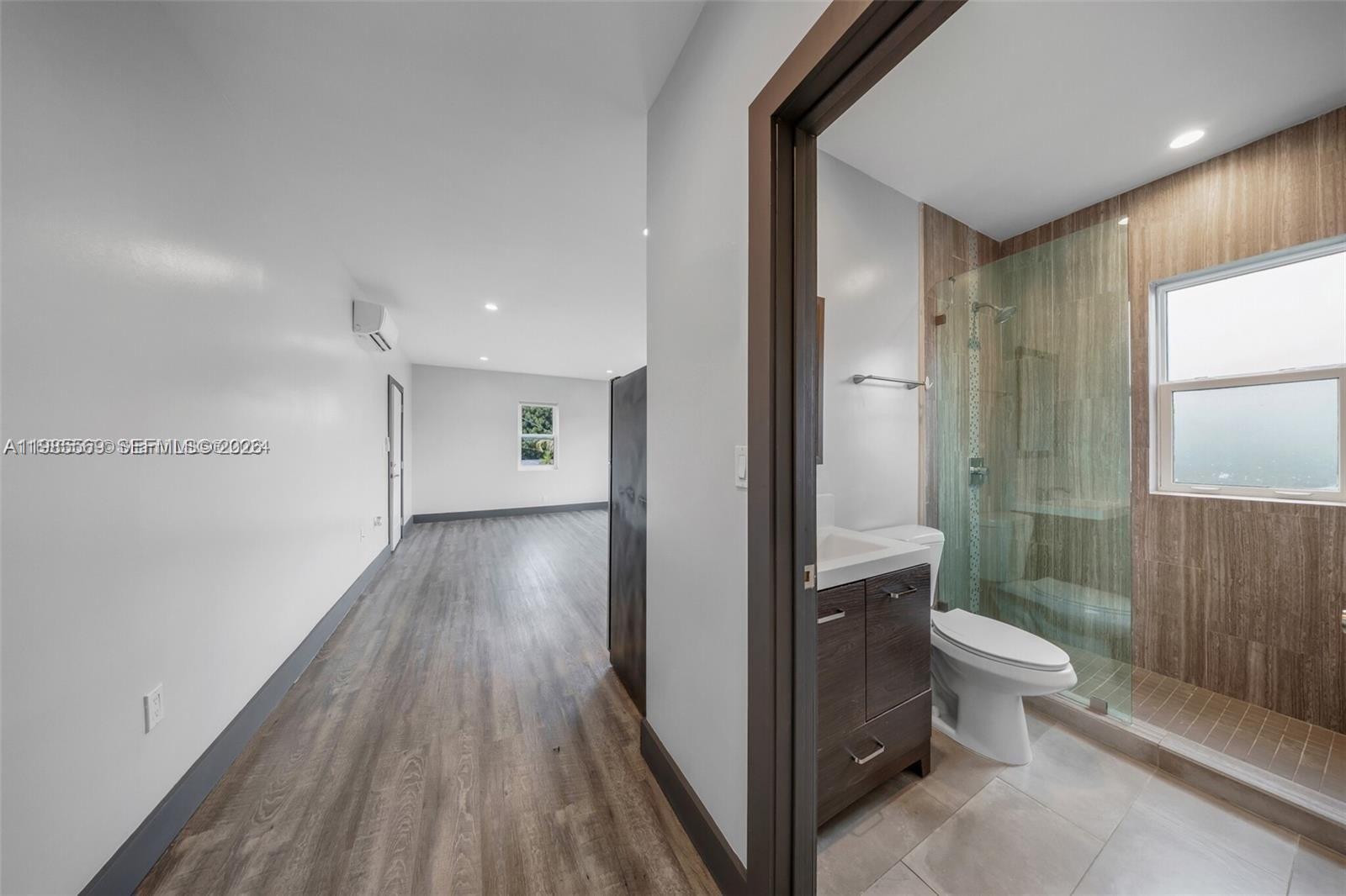 1020 Southwest 23rd Avenue, Unit 4 Miami, FL 33135 - Photo 11 of 17 a bathroom with a sink and a toilet